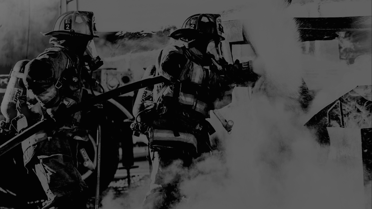 Black and white firefighters in action