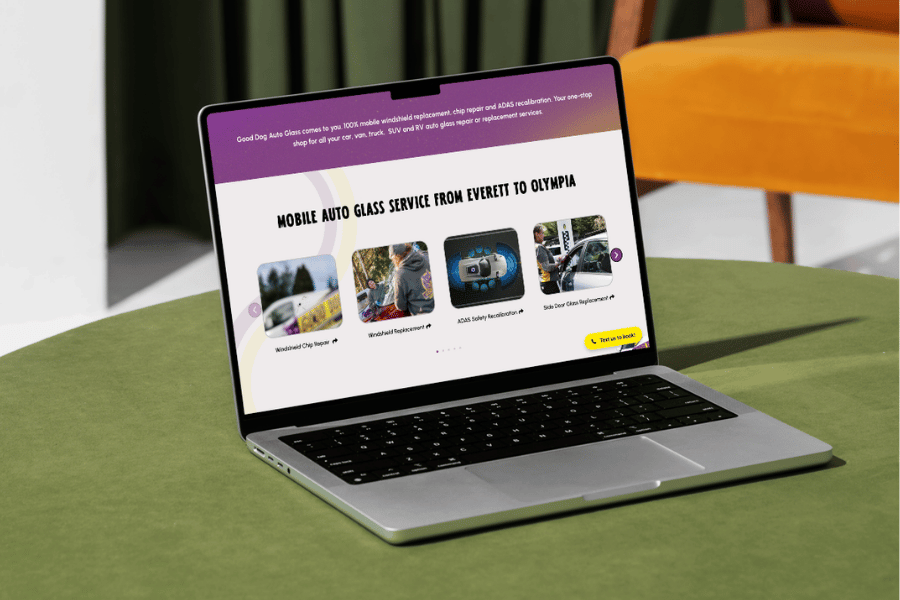 New Good Dog Auto Glass website shown on a laptop